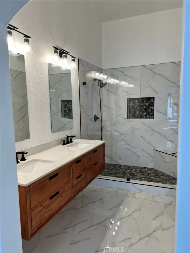 MLS: OC25040213 Condo For Sale