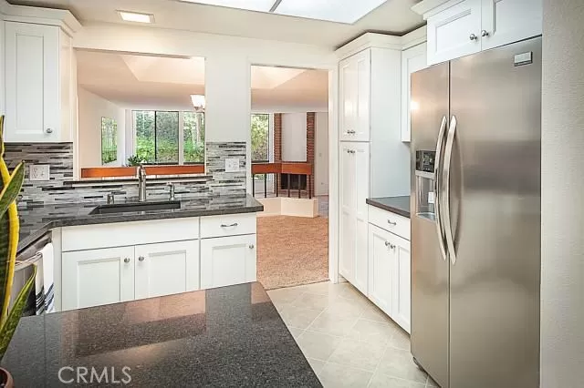 MLS: OC25046301 Condo For Sale