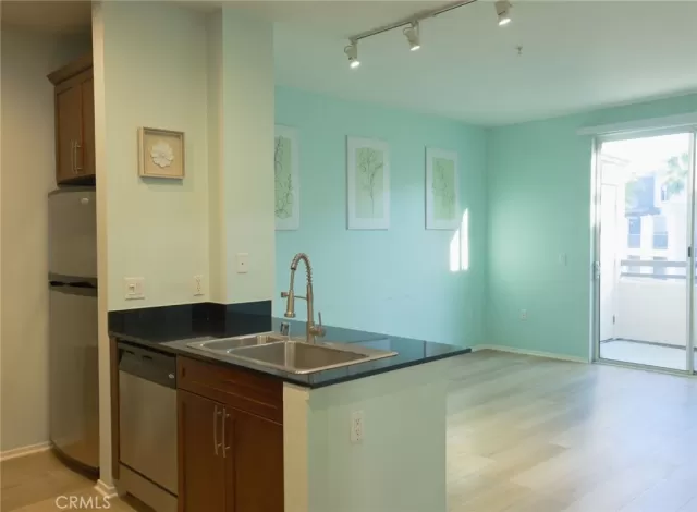 MLS: OC25051241 Condo For Sale