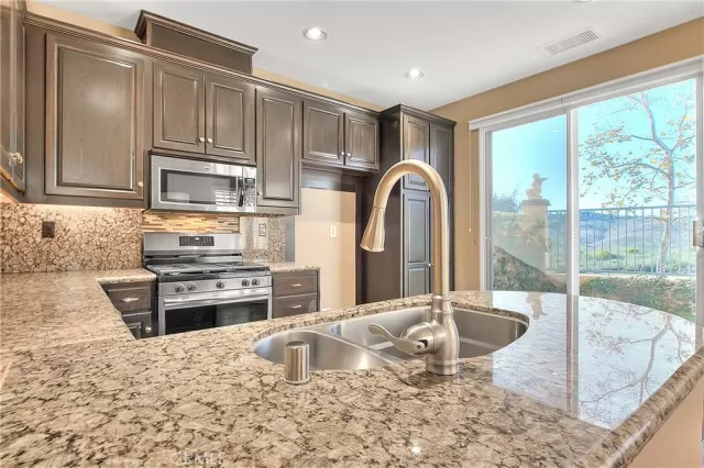 MLS: OC25052974 Condo For Sale