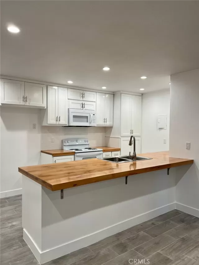 MLS: OC25055498 Condo For Sale