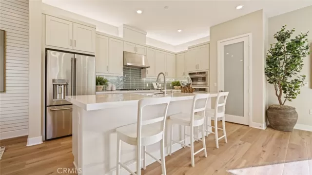 MLS: OC25058076 Condo For Sale