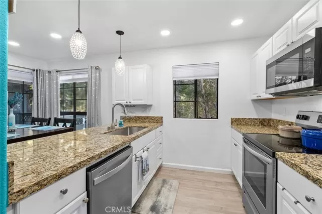 MLS: OC25058201 Condo For Sale