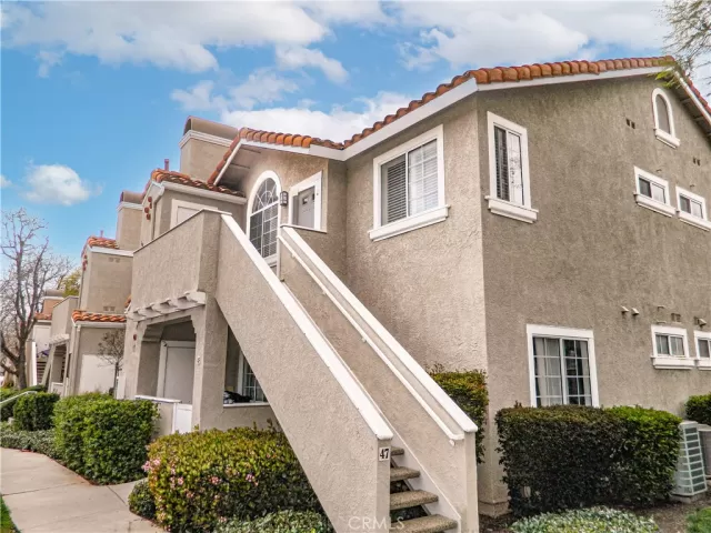 MLS: OC25059118 Condo For Sale