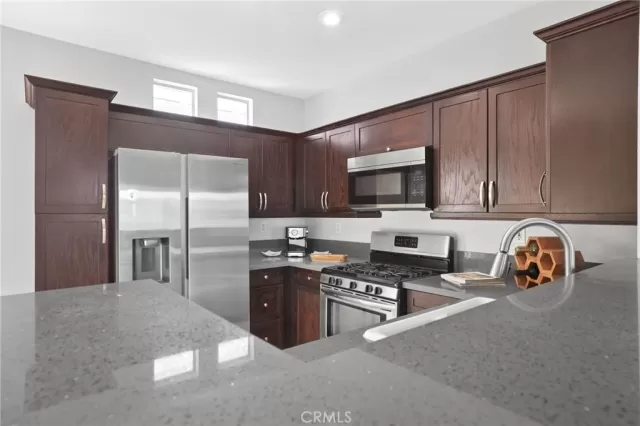 MLS: OC25063077 Condo For Sale