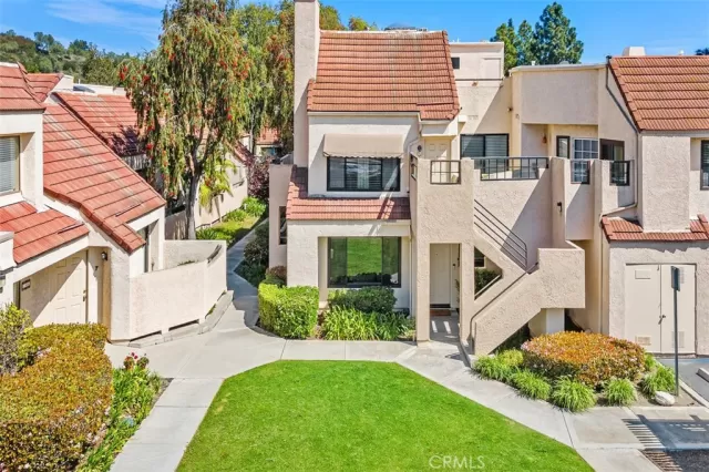 MLS: OC25064236 Condo For Sale