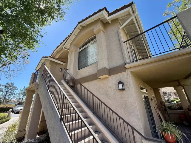 MLS: OC25064321 Condo For Sale