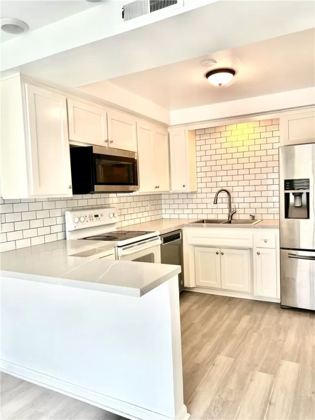 MLS: OC25067316 Condo For Sale