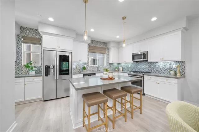 MLS: OC25073303 Condo For Sale