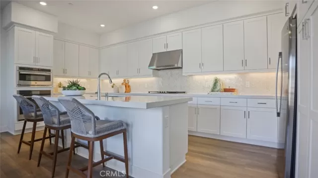 MLS: OC25074104 Condo For Sale