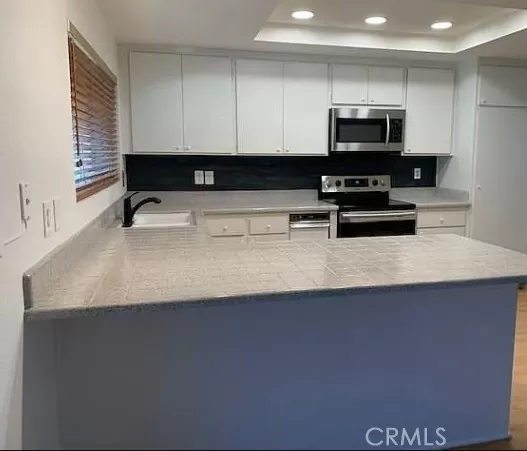 MLS: OC25076126 Condo For Sale