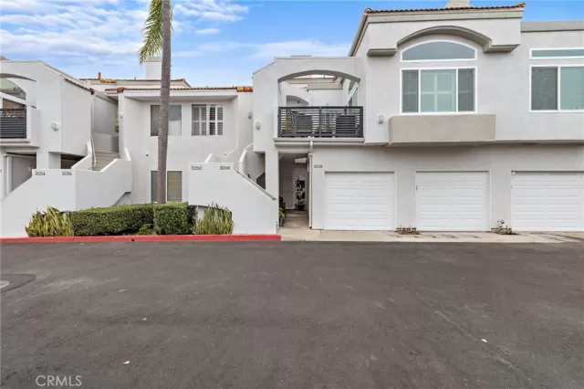 MLS: OC25085021 Condo For Sale