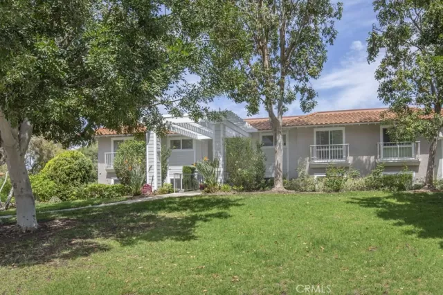 MLS: OC25086128 Condo For Sale