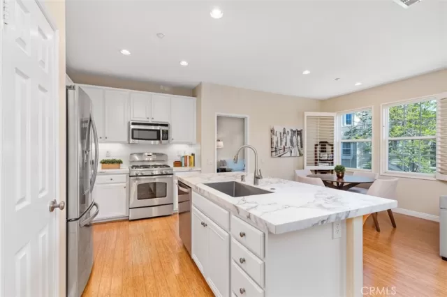 MLS: OC25086130 Condo For Sale