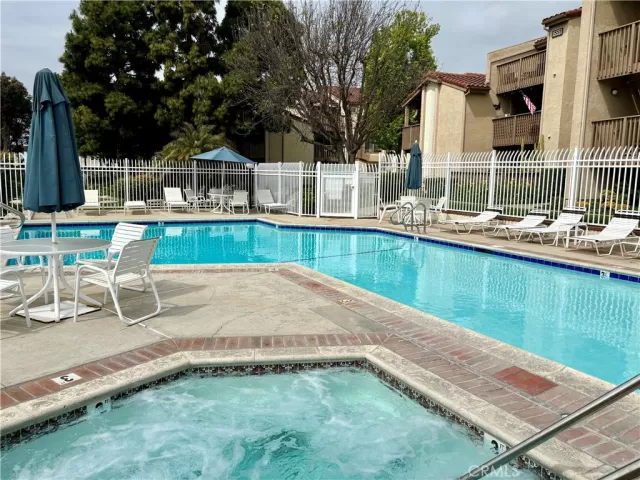 MLS: OC25088770 Condo For Sale