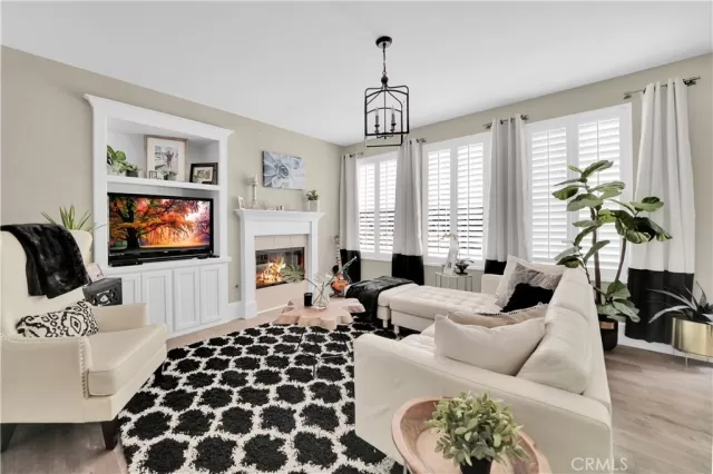 MLS: OC25088911 Condo For Sale