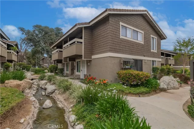 MLS: OC25088915 Condo For Sale