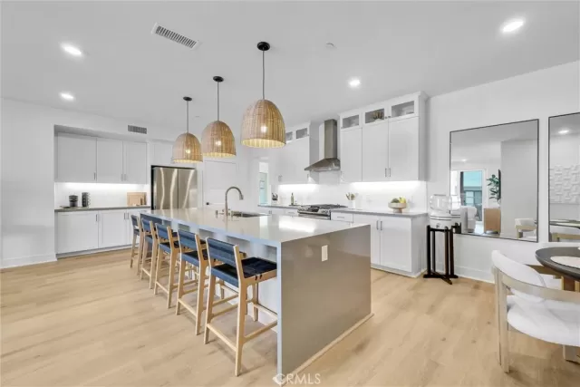 MLS: OC25089843 Condo For Sale