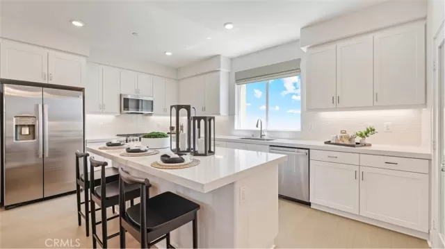 MLS: OC25095472 Condo For Sale