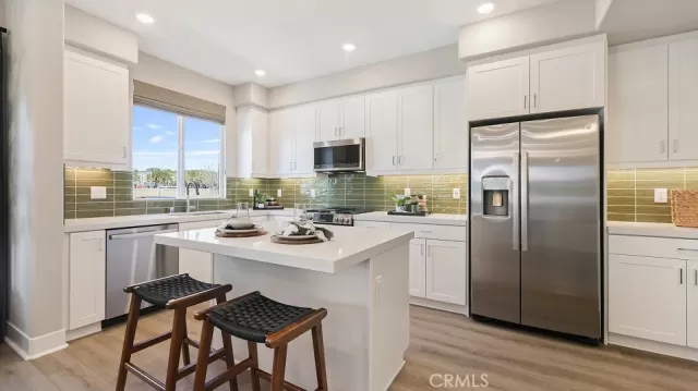 MLS: OC25097572 Condo For Sale