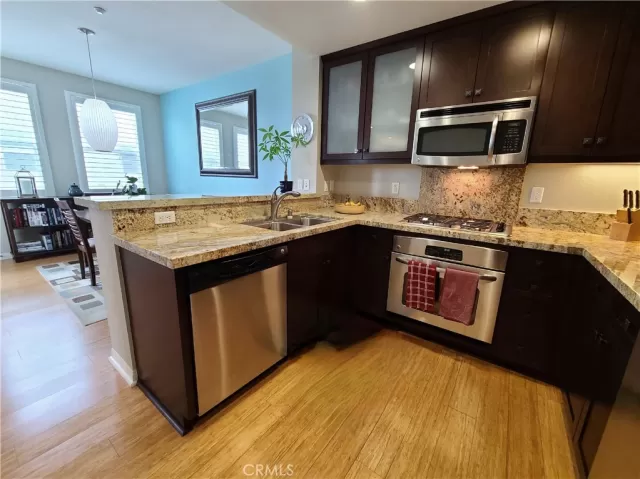 MLS: OC25098172 Condo For Sale