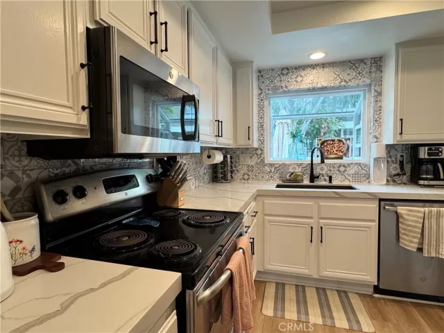 MLS: OC25099065 Condo For Sale