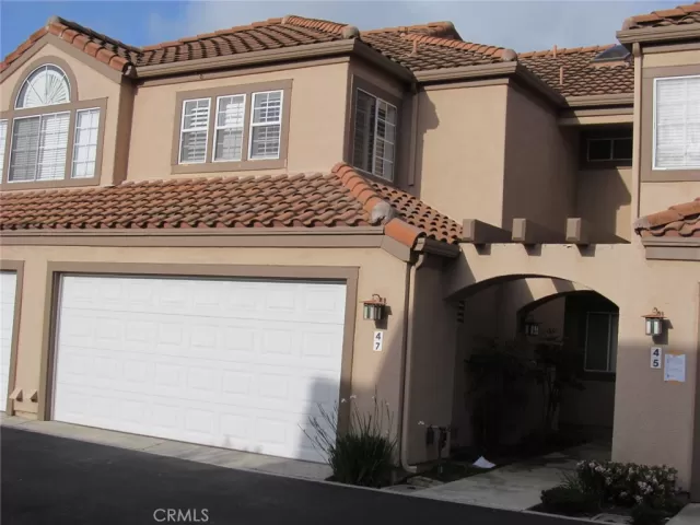 MLS: OC25102924 Condo For Sale