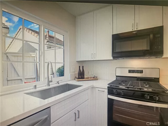 MLS: OC25103623 Condo For Sale