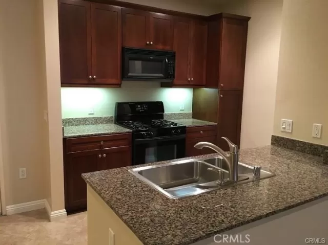 MLS: OC25104134 Condo For Sale