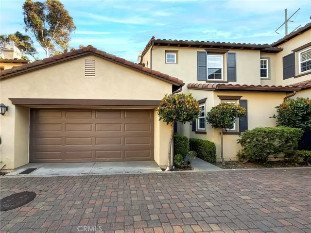 MLS: OC25109268 Condo For Sale