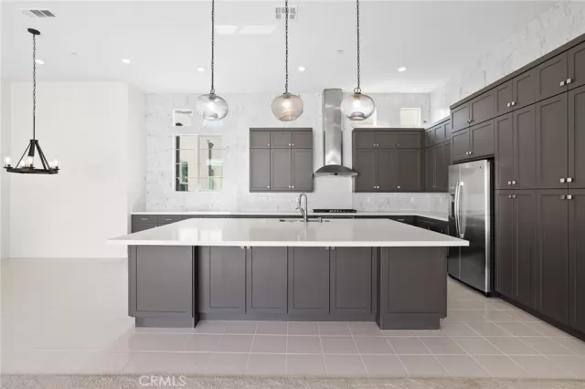 MLS: OC25116438 Condo For Sale