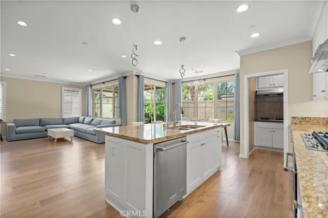 MLS: OC25117047 Condo For Sale