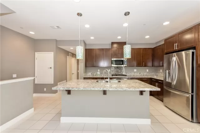 MLS: OC25128546 Condo For Sale