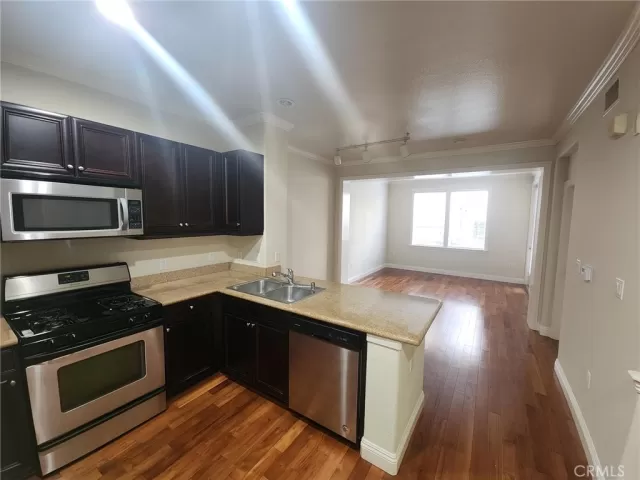 MLS: OC25130393 Condo For Sale