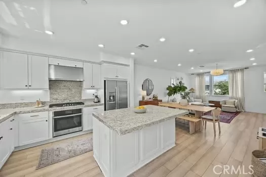 MLS: OC25143054 Condo For Sale