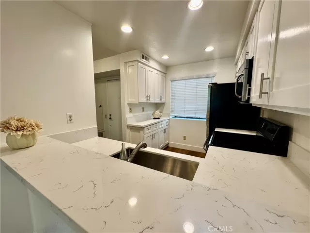 MLS: OC25143567 Condo For Sale