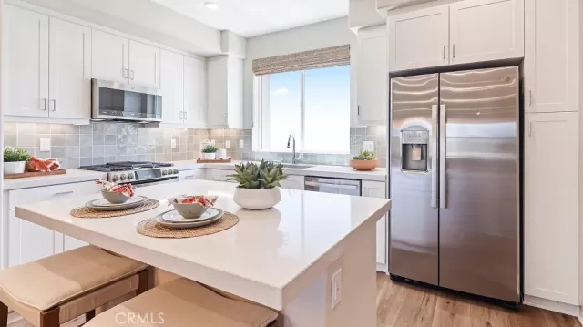 MLS: OC25146008 Condo For Sale