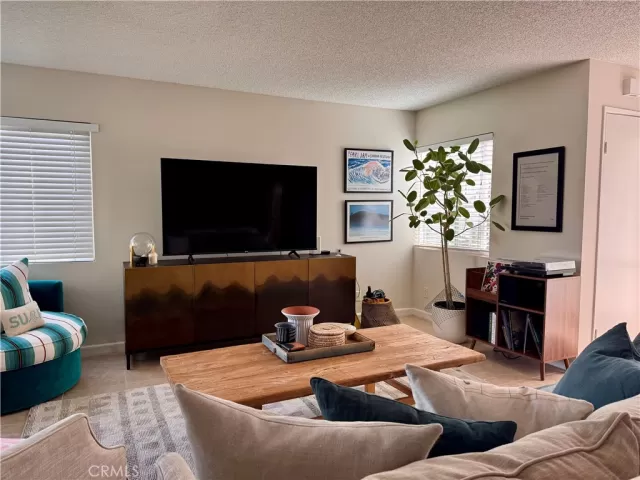 MLS: OC25148436 Condo For Sale