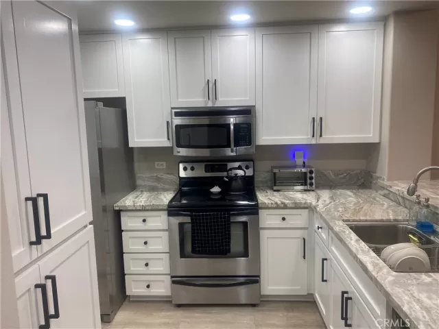 MLS: OC25151899 Condo For Sale