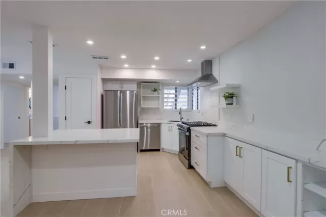 MLS: OC25180978 Condo For Sale