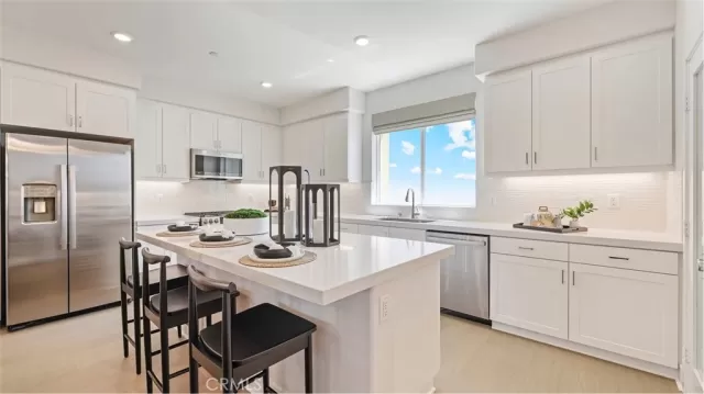 MLS: OC25223374 Condo For Sale