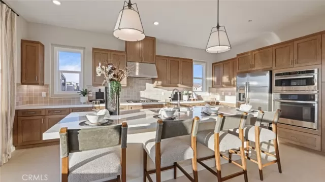 MLS: OC25241910 Condo For Sale