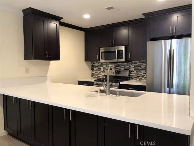 MLS: OC25242923 Condo For Sale