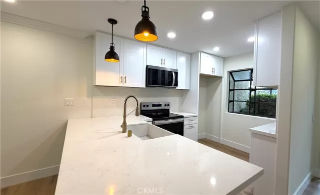 MLS: OC26040243 Condo For Sale