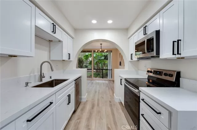 MLS: OC26102089 Condo For Sale